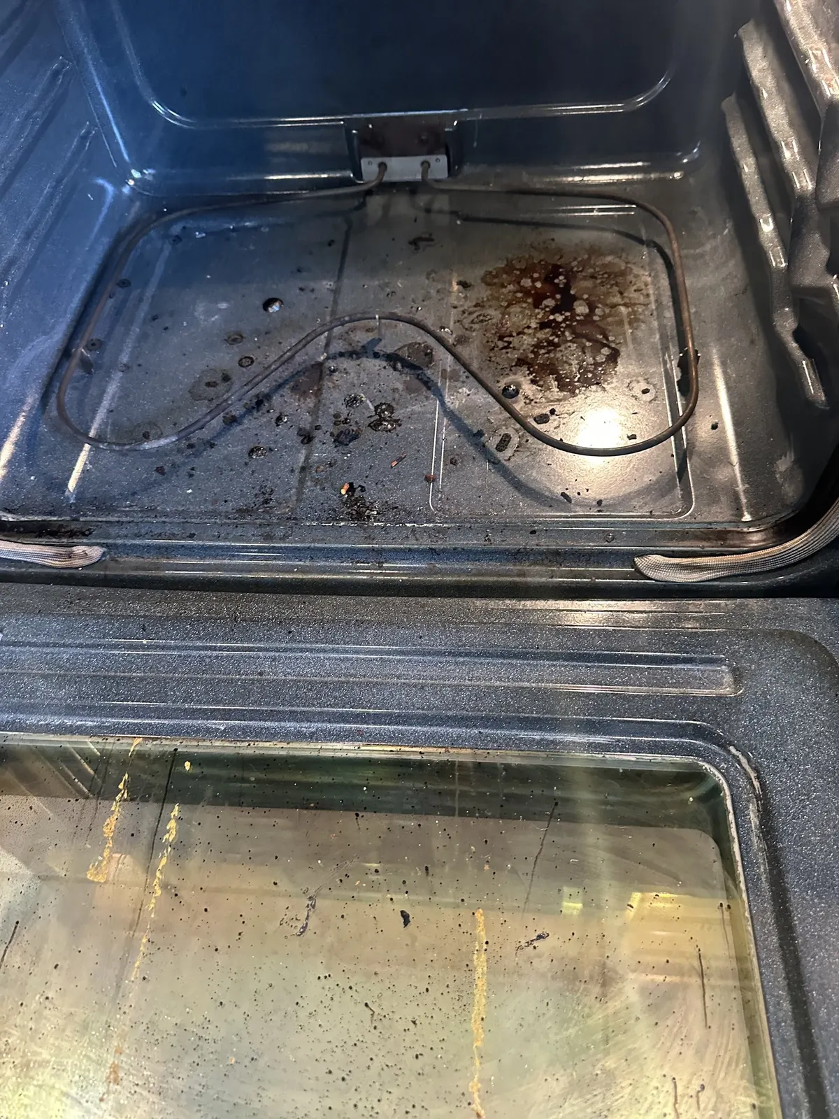 Oven floor and glass, before cleaning